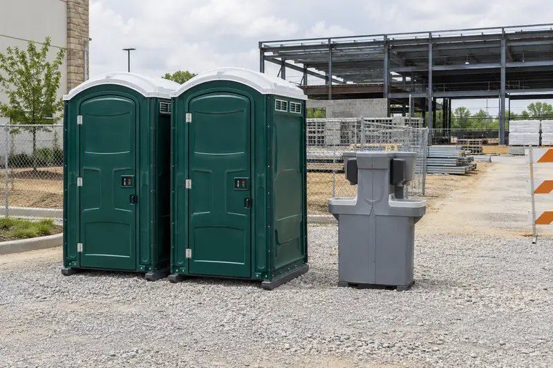 Temporary restrooms beside a worksite